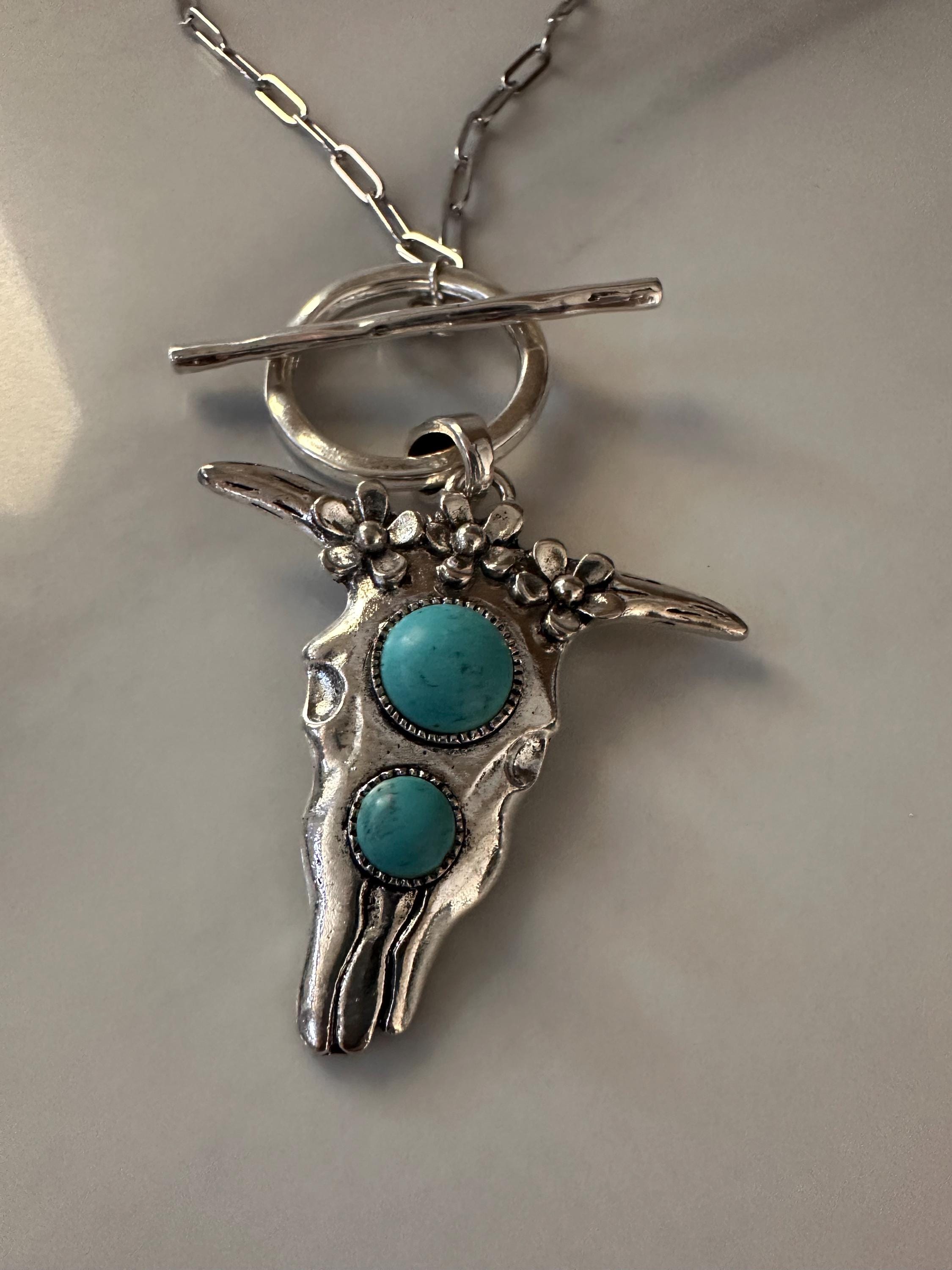 Silver Tone Steer w/Turquoise like stones on Stainless Steel chain with Toggle clasp