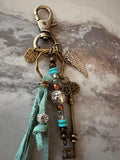 Key Chain, Antique Bronze,  Leather, Turquoise Beads, Glass Beads and Silver Charms