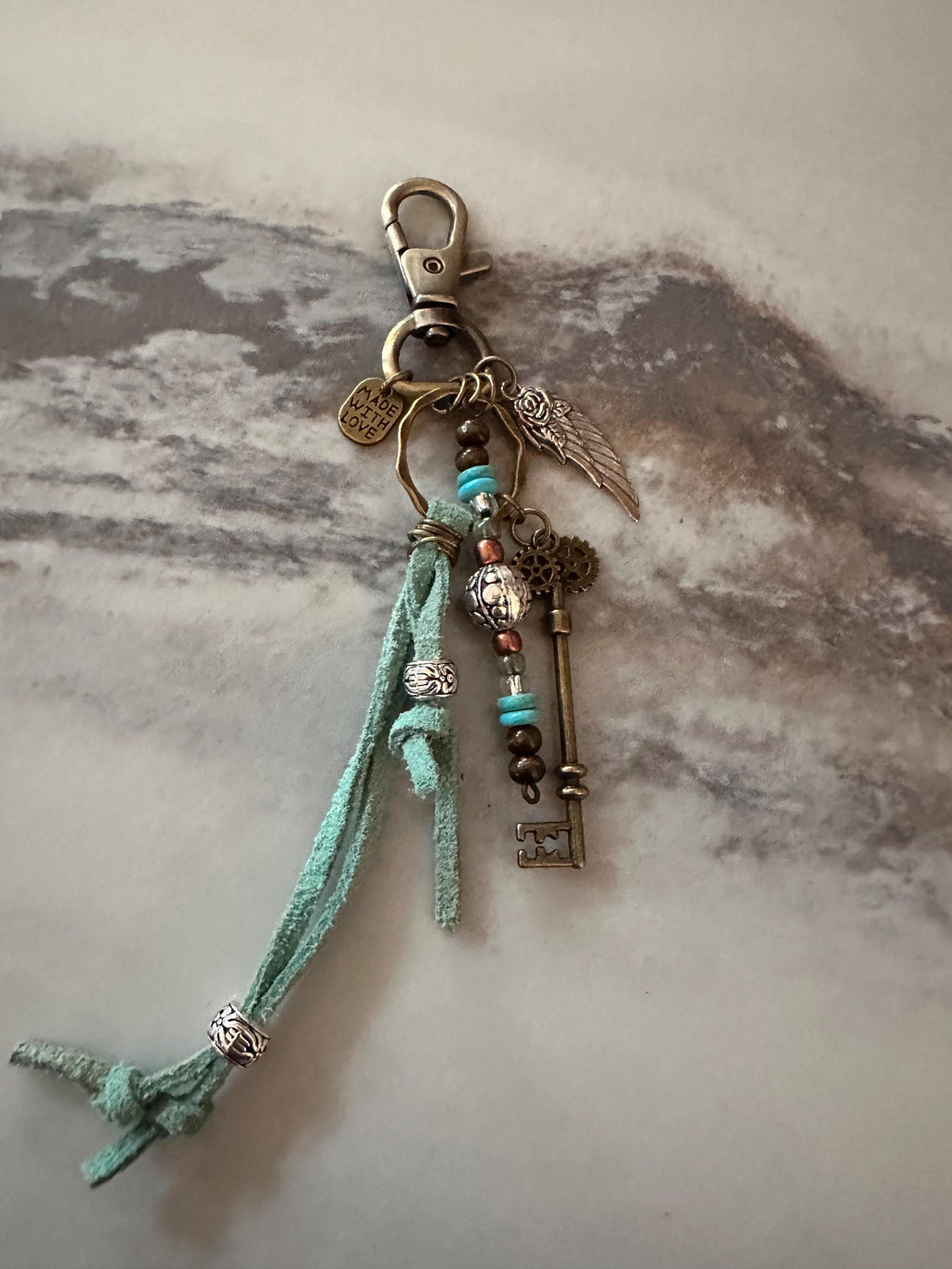 Key Chain, Antique Bronze,  Leather, Turquoise Beads, Glass Beads and Silver Charms