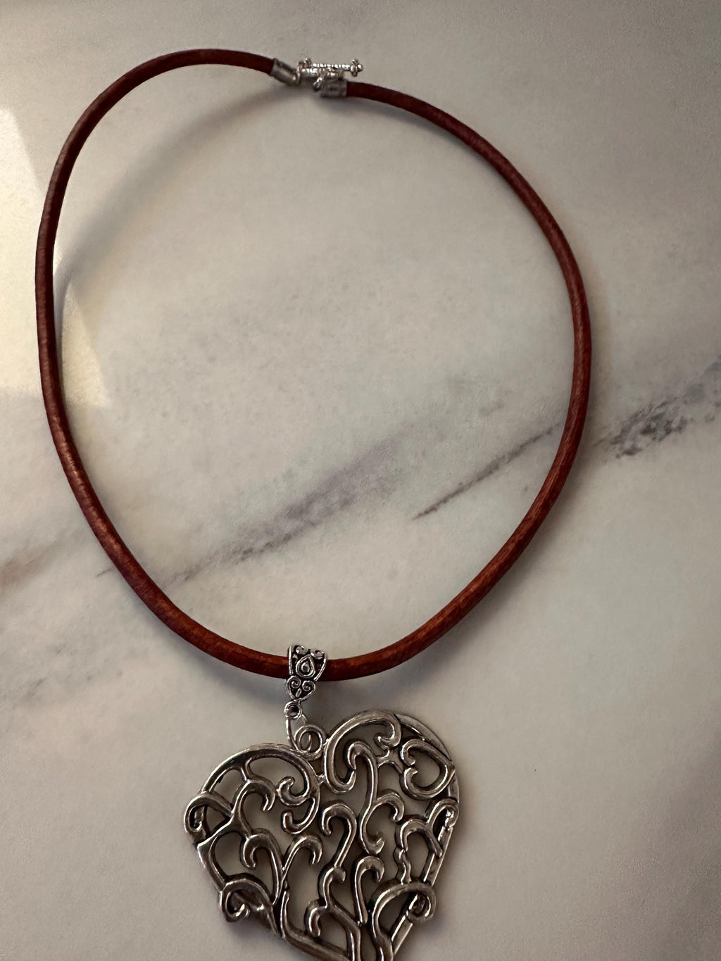 Antique Pewter Filigree Heart on Brown Leather Cord