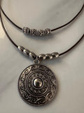 Necklace, Antique Silver Round Pendant with Stainless Steel Beads on a double layered leather cord