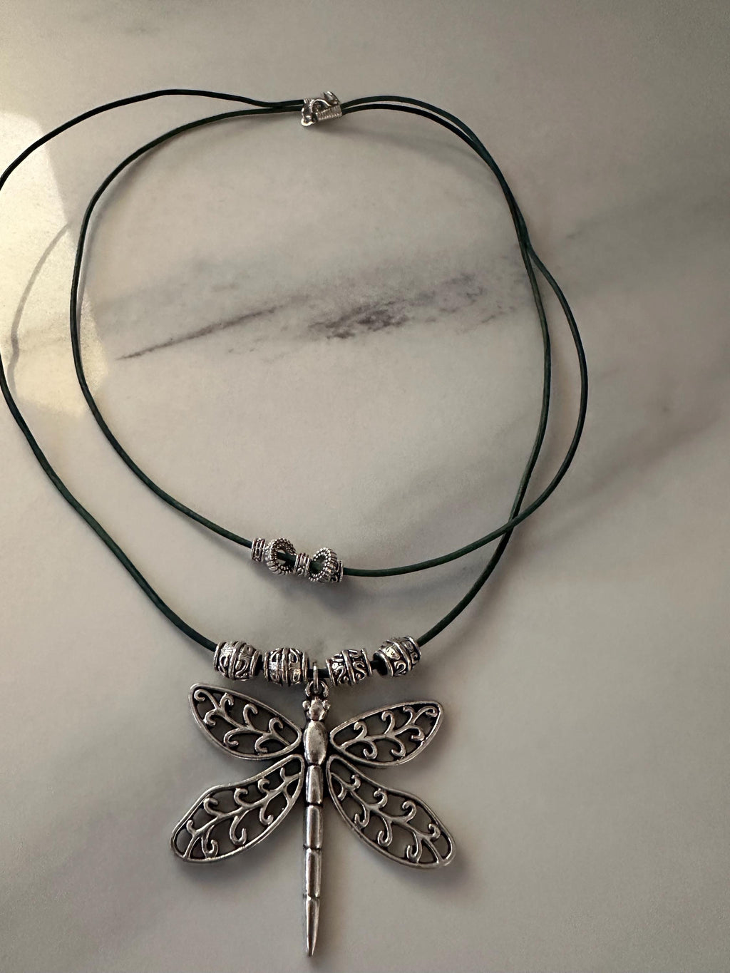 Antique Pewter Dragonfly with silver beads on double layered teal leather cord