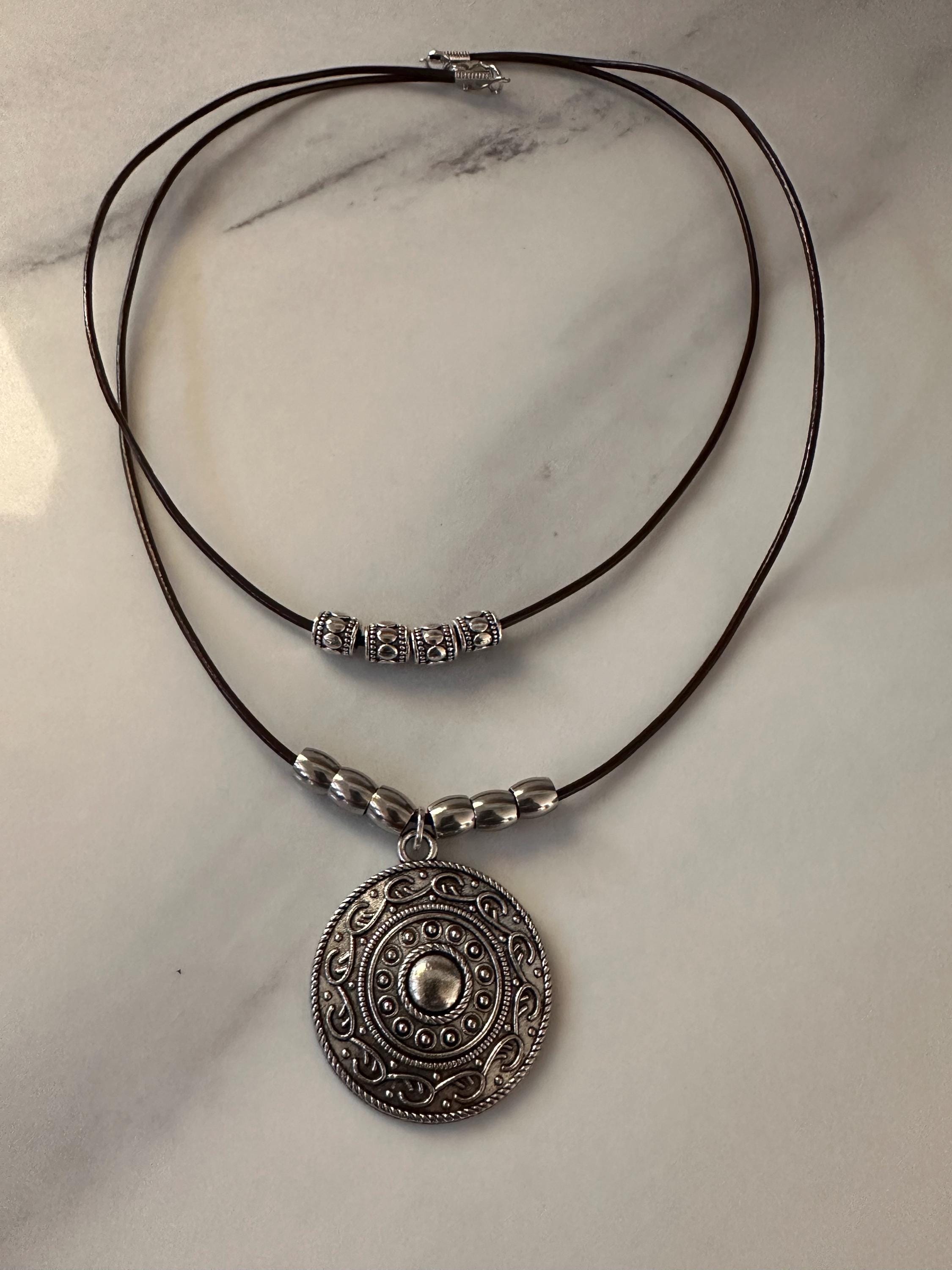 Antique Silver Round Pendant with Stainless Steel Beads on a double layered leather cord